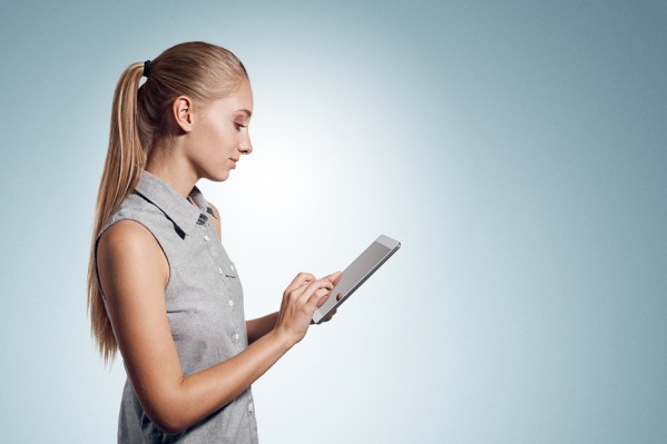 Tablet Computer. Business Woman Using Digital Tablet Computer Pc